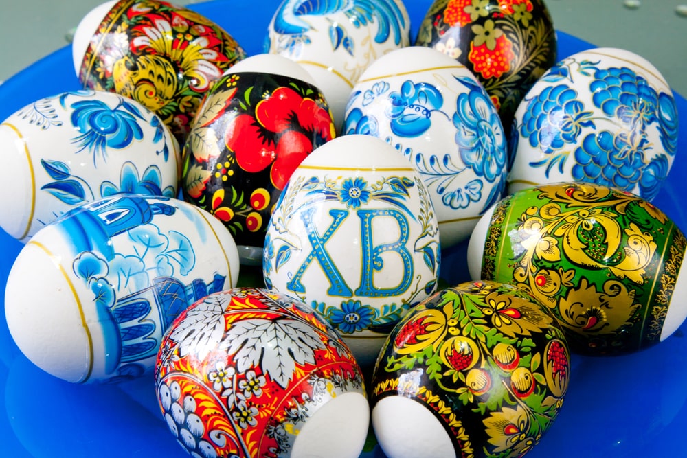 Easter eggs colored, hand painted and decorated with stickers.